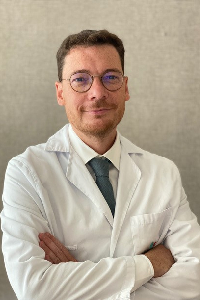 Dr. Oscar Godino